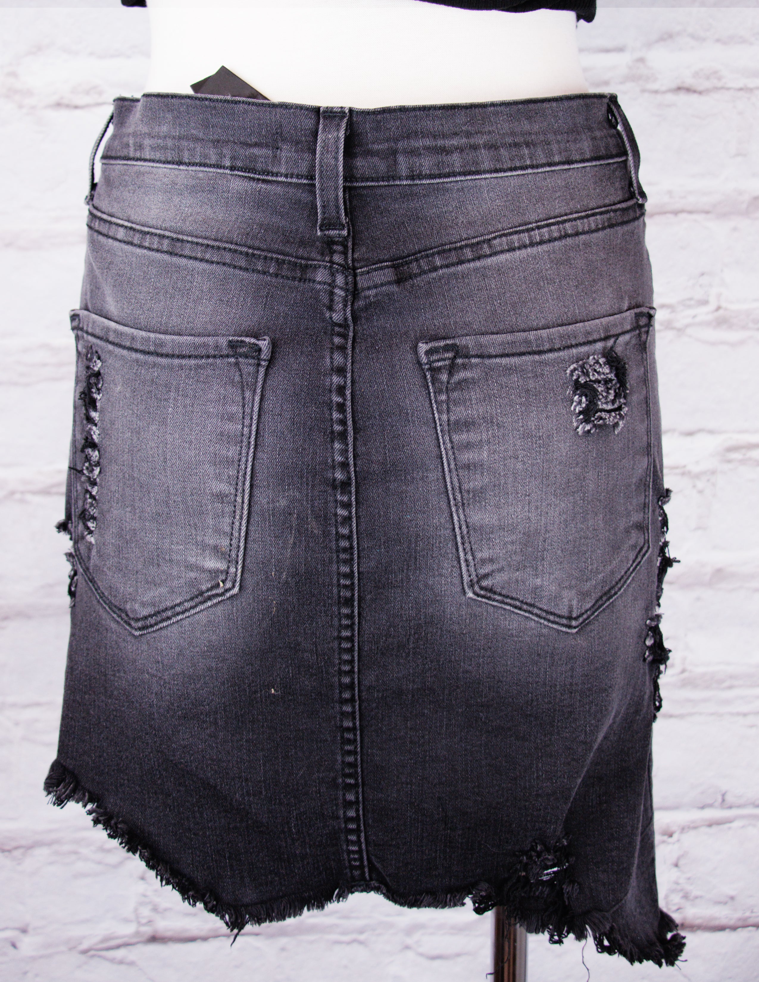 Ripped denim mini skirt