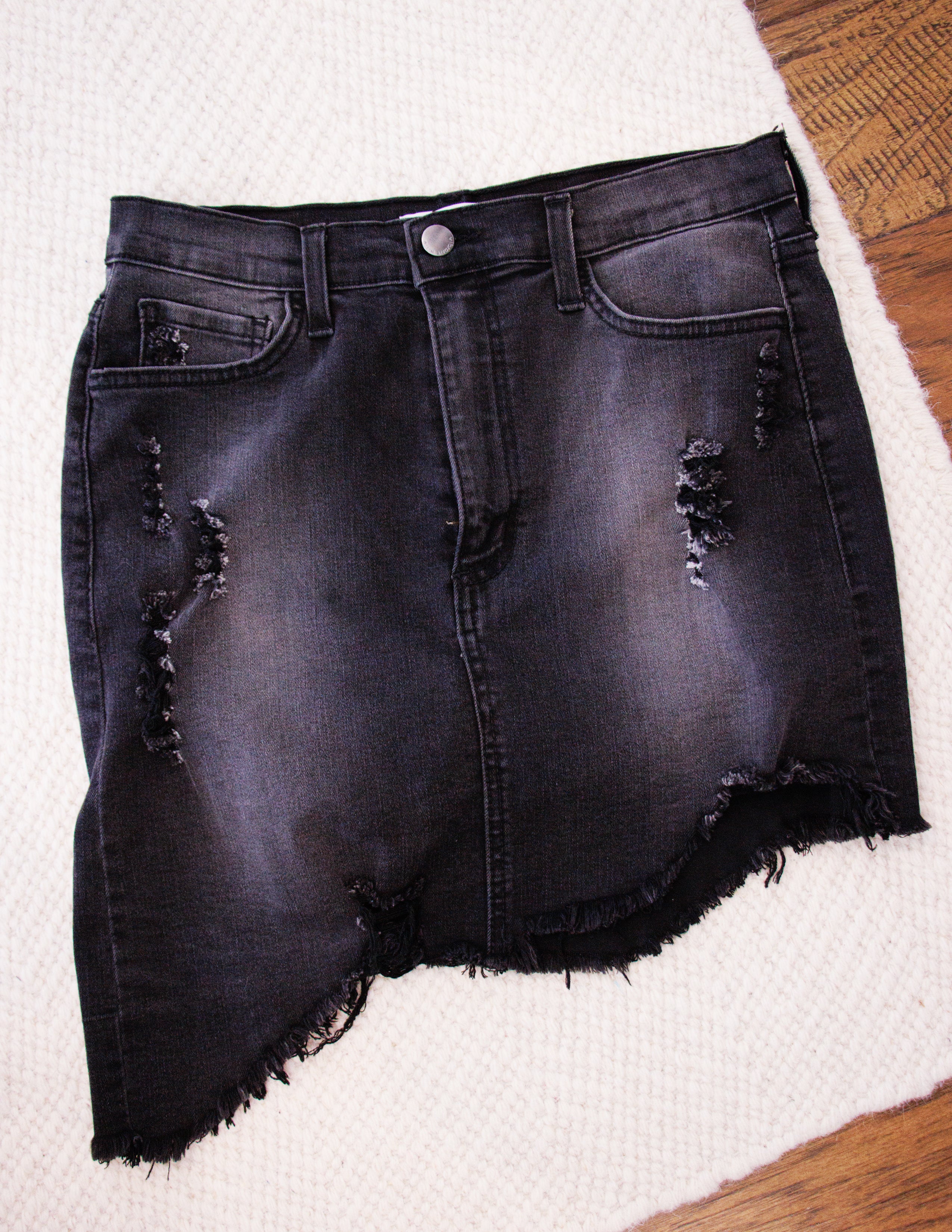 Ripped denim mini skirt