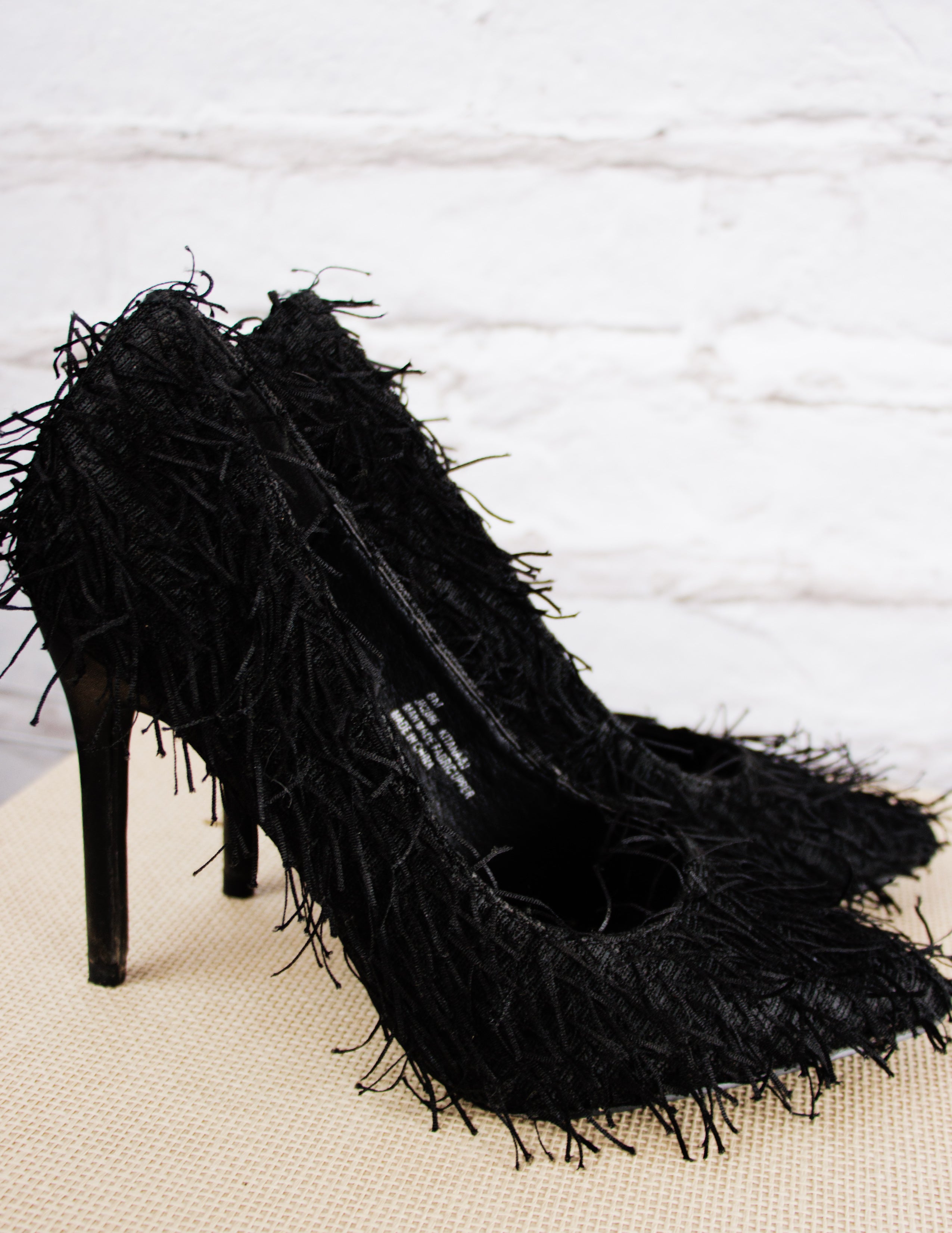 Black Fringe Pumps