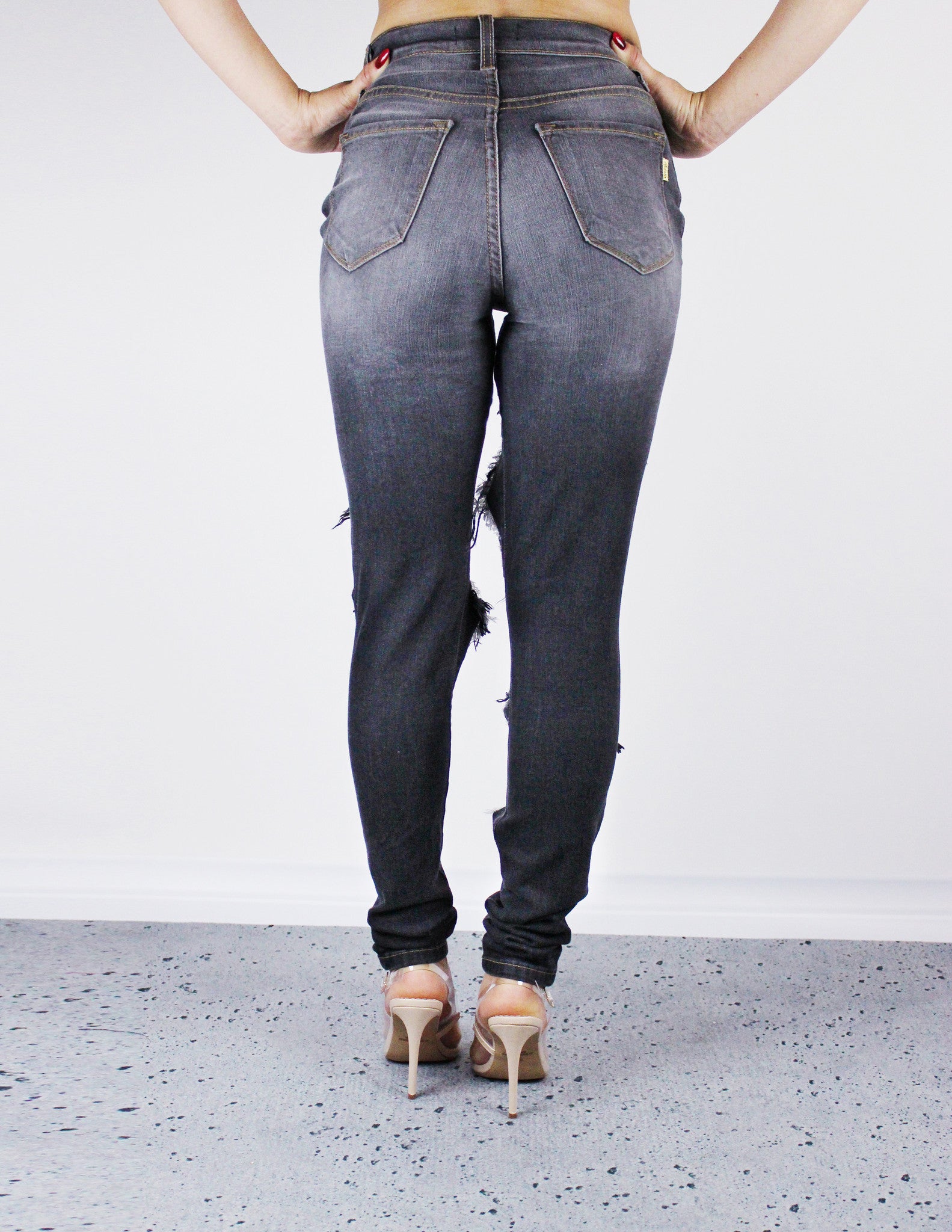 DISTRESSED GRAY JEANS